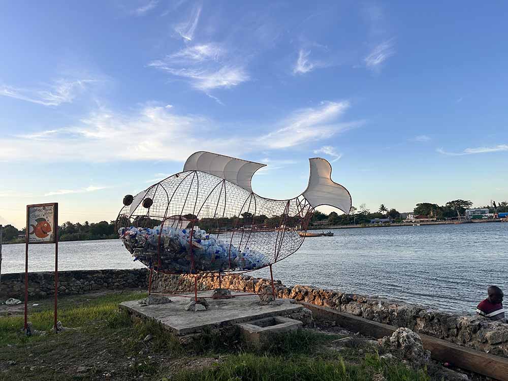 Artistic hollow Fish filled with plastic bottles at Pangani river beach clean up bottle project Pangani, Tanzania, Africa